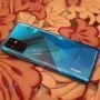 اینفینیکس Note 8 سبز روی میز