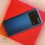 poco m4 pro 4g blue in hand